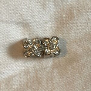 Two Pandora style flower/bow silver spacer beads for charm bracelet